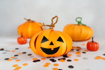 How to make Halloween pumpkin Jack from color paper with children. Step by step tutorial. Handmade DIY holiday decoration project. Step 16, final.