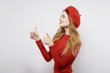 pretty woman with a red cap on his head glamor isolated background