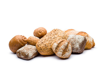 assortment of baked bread on white background