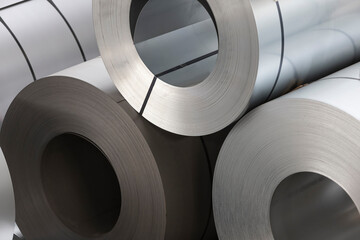 steel coils in warehouse, sylized background, heavy industries