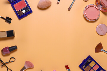 Creative flat lay composition of make up set with copy space or framing