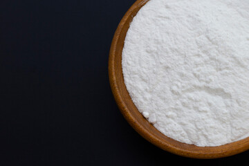Baking soda on dark background.