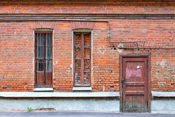 old door in a brick wall