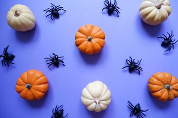 Halloween decoration on purple background. Happy Halloween composition. Halloween event, party, promotion design.