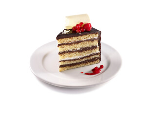 chocolate and berry layered cake on white plate 