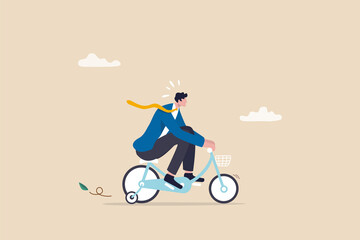 Practice, training or effort for career growth or business success, entrepreneur, amateur begin or start new business concept, newcomer businessman practice riding child bicycle with training wheels.