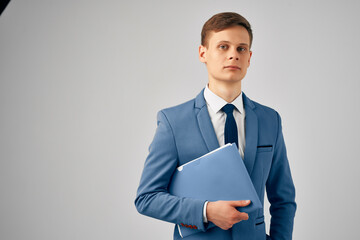 man in suit documents work manager lifestyle