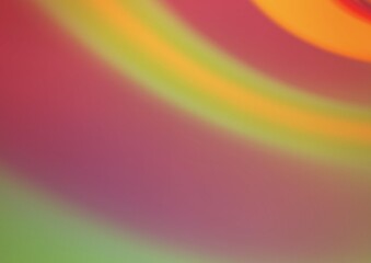 Light Orange vector blurred shine abstract pattern.