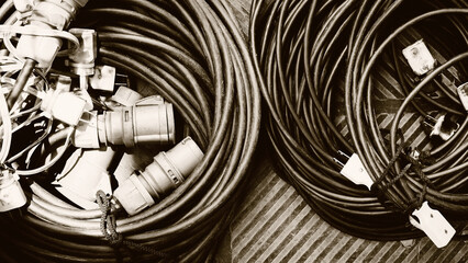 Filming Equipment, Pile of power plugs Background