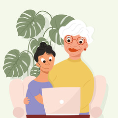 Granddaughter teaches her grandmother to work at the computer