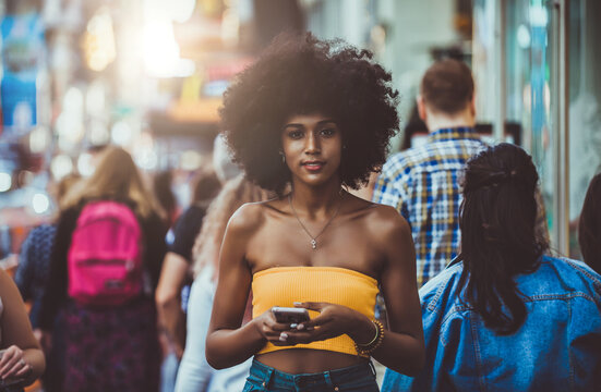 Young beautiful girl walking in Time square, manhattan. Lifestyle concepts about New york
