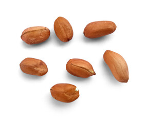 Closeup of a small pile of raw red fresh peanuts on a white background