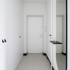 Stylish apartment corridor in white