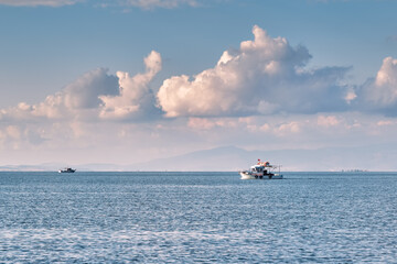 Fishing boat sailing over the sea in Urla Izmir Turkey