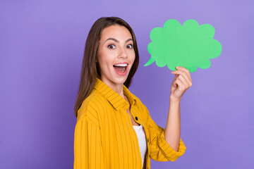 Photo of amazed positive young woman tell surprise news unbelievable information isolated on purple color background