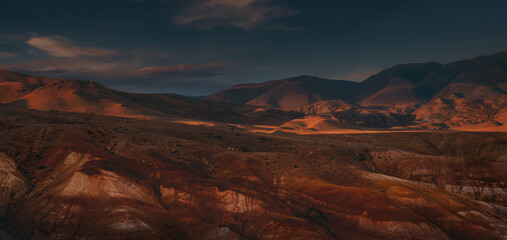 Panorama of red mountains. Altai, Kyzyl-Chin valley, also called Mars
