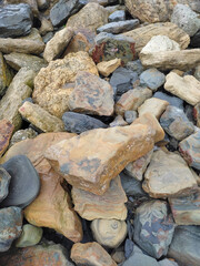 Texture wet large stones, vertical background. 