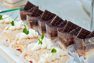 Sweets on the table. Colorful cookies and pastries at the fair. Demonstration of local confectionery.