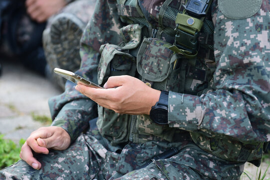 South Korean Army Soldier Using the Smartphone