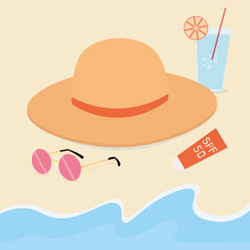 The concept of a vacation trip to the sea or ocean. Beach holidays. On the sandy shore, washed by the waves, lies a straw hat, round sunglasses with pink lenses, sunscreen and a refreshing cocktail