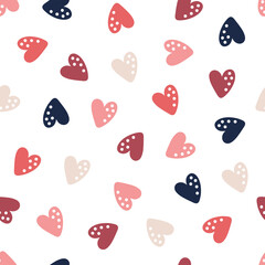 Seamless pattern with cute colorful hearts