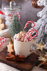 Christmas candy cane heart shape, bokeh background.