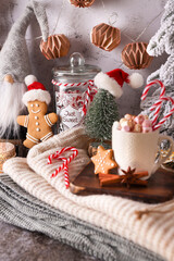 Christmas candy cane heart shape, bokeh background.