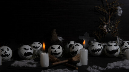HALLOWEEN, GOLF BALLS DECORATED LIKE PUMPKINS WITH TERRORIFIC FACES WITH CANDLES, FOLIAGE, CROSSES,...