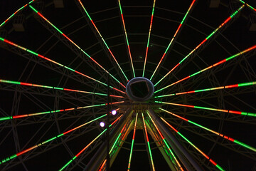 illuminated ferris wheel at night