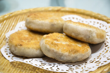 Shrimp cabbage pie on bamboo plate