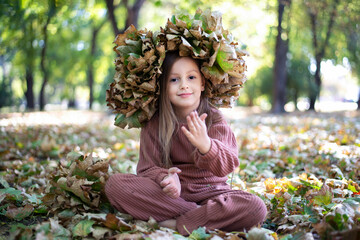 Girl is holding a ladybug one sunny autumn day  © nellas