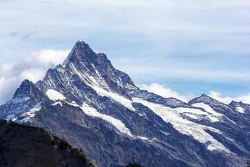 Obraz premium Close view of the Schreckhorn Mountain in the Bernese Alps of Switzerland