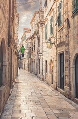 Naklejka na ściany i meble Travel to Croatia. Dubrovnik, most people visit the old town filled with restaurants, shops, museums, ancient palaces, cathedrals, and lovely beaches. Stradun street in old part city in the summer