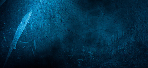 Blue wall background. The dark blue walls are scary. Scratched blue cement