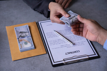 businessman or corrupt politician and willing to accept bribes given in dollar cash To do illegal...