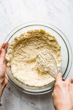 Preparing the ingredients and mixture for a strawberry cake, made with almond flour