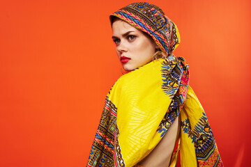 pretty woman multicolored shawl ethnicity african style red background