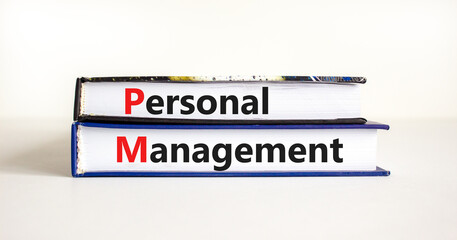 Personal management symbol. Concept words 'Personal management' on books on a beautiful white table, white background. Business and personal management concept.