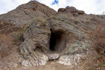 Small cave in Tamgaly Tas tract. Tamgaly became a UNESCO World Heritage Site in 2004. Republic of...