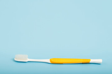 Techniques for storing toothbrushes and cleaning brushes after use to reduce the accumulation of germs and bacteria