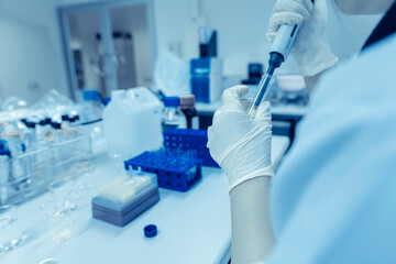 Fototapeta premium Chemists mixed up chemical to find antiretroviral drugs at the lab,Experiment to detect virus was found in the blood,Developers of potential medicines and vaccines against COVID-19