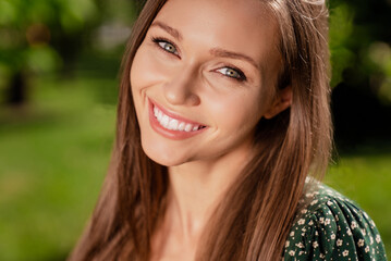 Fototapeta premium Photo of charming young happy cheerful woman summer enjoy smile face vacation outdoors outside park