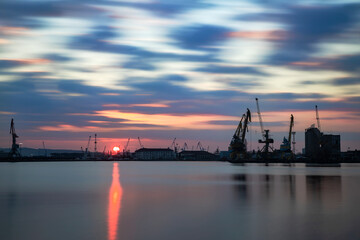 Fototapeta na wymiar sunset over the harbor in Burgas city