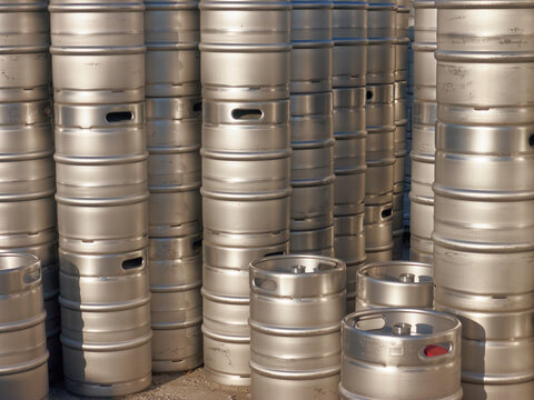 warehouse of special barrels for beer storage - kegs, new aluminum kegs