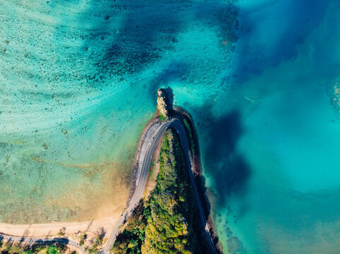 Maconde point with road and clear ocean. Aerial View in Mauritius Island