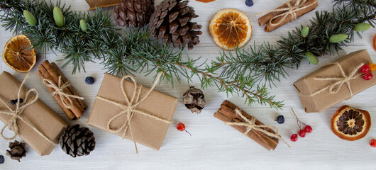 Obraz na płótnie Canvas Christmas composition. Christmas gifts, pine cones, Christmas decorations. ECO decorations.