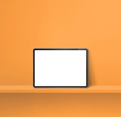 Digital tablet pc on orange wall shelf. Square background banner