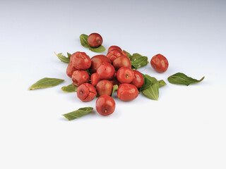 jujube fruits on white background green leaves