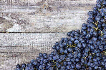 Blueberries on a wooden background. Textures and backgrounds.