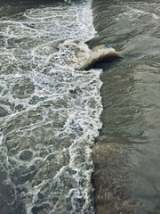 Boiling water in motion. Mountain river. Rapid stormy water. Background for any design. Autumn season.